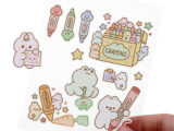 Kiss-cut vinyl sticker sheets with cute cartoon characters