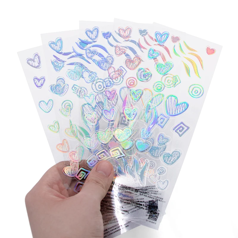 Holographic clear sticker sheets with rainbow heart designs - Sticker Sheet Printing