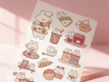 Custom clear sticker sheets featuring multiple die-cut shapes on transparent backing - Sticker Sheet Printing